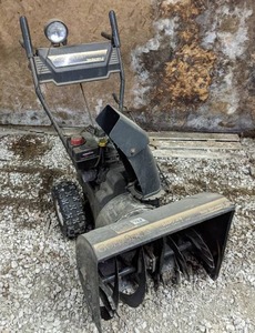 lot 147 image: Yard Machines 24 Two-Stage Snow Blower with Electric Start