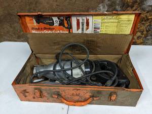 lot 148 image: Black & Decker Heavy Duty Cut Saw in Metal Case