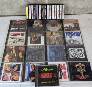 lot 115 image: Treasure Trove of 80s Music CDs and Cassettes in Bins (Bon Jovi, Def Leppard, Tone Loc, Young MC) and More