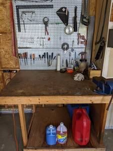 lot 115 image: Assorted Tools and Garage Items (Bench Vice, Hammers, Screw Drivers, Nu Finish Car Polish, Saws, Level, Windshield Fluid, and More)