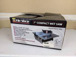 lot 128 image: The Tile Shop 7 Compact Wet Saw