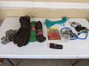 lot 141 image: Assortment of Garage Items Para Cord, Chains, Buck Knife, Tool Shop, Etc.