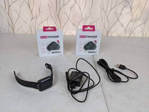 lot 96 image: Smart Watch with Chargers and (2) T-Mobile SyncUP Trackers
