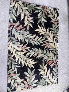 lot 76 image: Area Rug with Leaf Pattern on Black Background