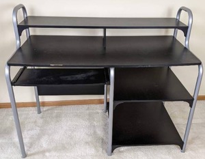 lot 54 image: Black and Silver Desk with Multi-Level Shelves and Pull-Out Keyboard Tray