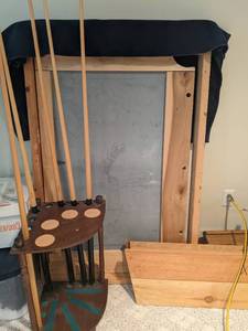 lot 57 image: Pool Table with Balls, Rack, Cue Stand with 5 Pool Cues and More