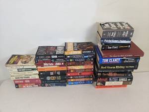 lot 77 image: Collection of (37) Fiction Novels (Nora Roberts, Tom Clancy, Stephen King, and More)