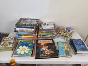 lot 81 image: Assorted Modern & Vintage Childrens Books (Sesame Street, Little Golden Books, Darth Vader & Son, Richard Scarry, I Spy, Artemis Fowl, and more)