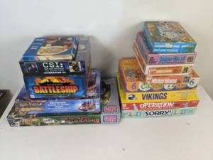 lot 78 image: Set of (13) Assorted Games and Vintage Kids Puzzles (Mickey Mouse, Harry Potter, MN Vikings, Sorry, Operation, CSI, and More)