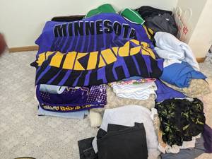 lot 96 image: Grab Bag of Bedding, Blankets, and Clothing