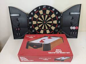 lot 91 image: Electronic Dart Board and Tabletop Air Hockey Set