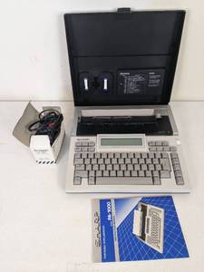 lot 113 image: SHARP PA-1000 Portable Typewriter with Cover