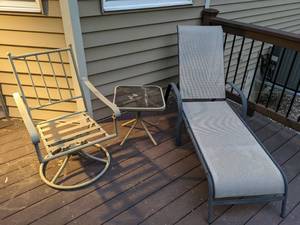 lot 151 image: Patio Furniture Metal Swivel Chair, Glass Topped Side Table, Chaise Lounge