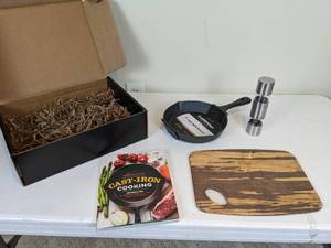 lot 135 image: NEW Craft Kitchen 8 Cast Iron Skillet, Cast Iron Cookbook, Cutting Board, SaltPepper Mill