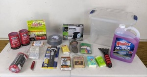 lot 25 image: Emergency Car Kit Liquid Wax Candle, Duct Tape, Digital Tire Inflator, Emergency Blanket, Sleeping Bag and Much More