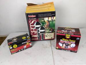 lot 193 image: Collection of Outdoor Lights Heath Zenith Motion Sensor Security Light, Philips Halogen 2000 Flood Lights and Malibu Landscape Lighting
