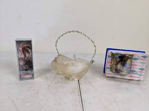lot 224 image: Collection of Silver Plated Brass Basket, W.M. A. Rogers by Oneida Silversmiths Cup, and Community Silverplate by Oneida Silversmiths