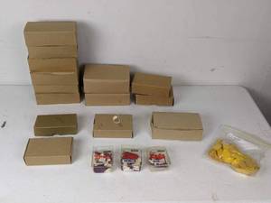 lot 259 image: (18) Small Containers of Assorted Merchandise Tags
