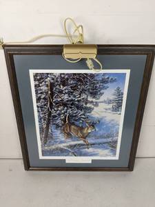 lot 98 image: SignedNumbered Art Fast Moving Game-Whitetail Deer by James A. Meger with Picture Light