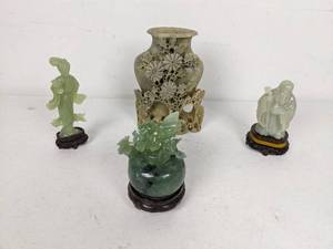 lot 106 image: Collection of (4) Table Centerpieces Glass Flower Bowl, Woman on Stand, Standing Man and Stone Vase