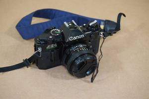 lot 92 image: Canon AE-1 Program 35mm SLR Camera 50mm 11.8 Lens