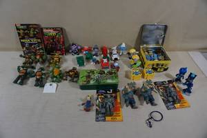 lot 195 image: Assorted Action Figures - Turtles, Minions, Disney, Sesame