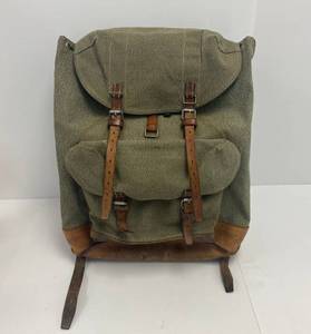 lot 22 image: Vintage Swiss Military BackpackRucksack With Salt And Pepper Canvas And Leather Straps