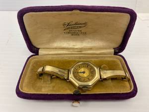 lot 103 image: Vintage Lily Brand Wrist Watch Marked 14K And 15 Jewels With Case