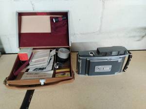 lot 380 image: Vintage Polaroid Land Camera 900 Electric Eye