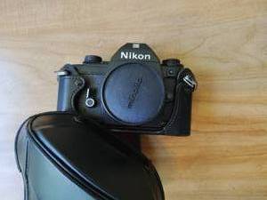 lot 413 image: Nikon EM Camera with Case