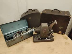 lot 237 image: Bell & Howell Filmo Projector, Acme Lite Movie Lights, & Gun-Ho Case