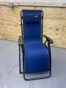 lot 23 image: GUIDESMAN Foldable Locking Weather Resistant Outdoor Steel Framed Zero Gravity Reclining Lounge Chair with Headrest Pillow, Blue