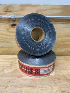 lot 123 image: Lot of 2 Rolls of Caution Tape (Caution Electrical Line Below)