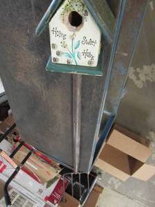 pitchfork with birdhouse on top ...