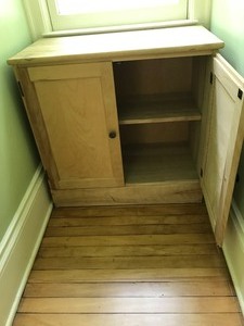 Wood storage cabinet