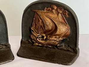 lot 93 image: Pair of Metal Ship Motif Bookends