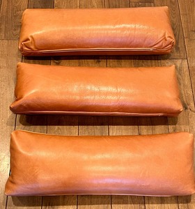 Three Leather Throw Pillows