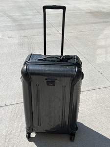 Tumi Brand Rolling Suitcase