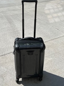 Tumi Brand Rolling Suitcase (Carry On)