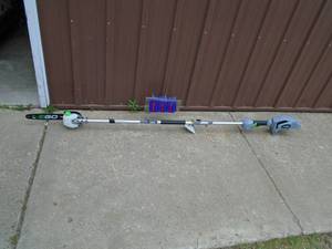E-Go 56 volt pole saw. No chain. No battery or charger. Small crack at battery end. Looks new. As shown.