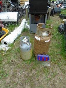 Forklift gas tank & freon recovery tanks. As shown.