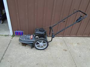 Fence line weed trimmer. Good used condition. Tested & works. As shown.
