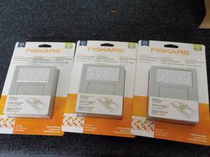lot 106 image: 3 Fiskars Punch System Cartridges...