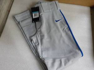 lot 146 image: 7 NIKE Grey with Royal Blue Stripes...