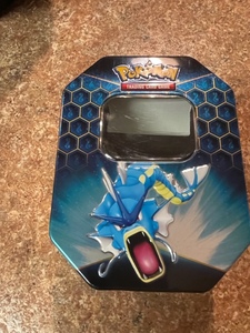 lot 57 image: Pokemon Hidden Fates Metal Tin