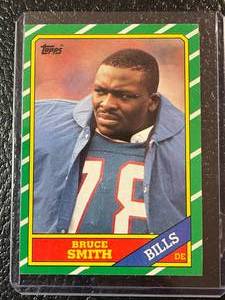 lot 81 image: 1986 Topps Bruce Smith Rookie Card #389