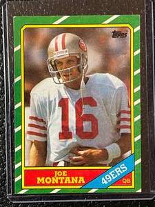 lot 97 image: 1986 Topps Joe Montana Card #156