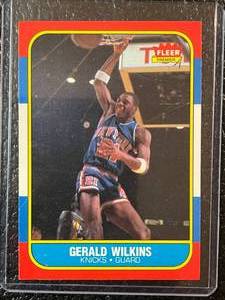 lot 131 image: 1986 Fleer Gerald Wilkins Rookie Card #122