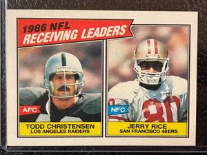lot 153 image: 1987 Topps Jerry Rice Todd Christensen Receiving Leaders Card #228
