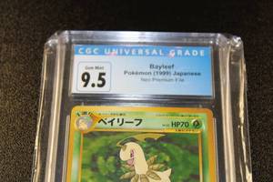 lot 104 image: 1999 Pokemon Neo Premium File Bayleaf Japanese CGC 9.5